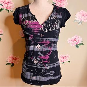 Calvin Klein Tee With Graphic on the Front.    U-6